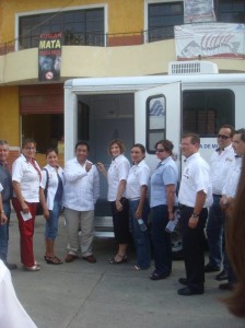 Members of the Huejutla club hand off the keys to the trailer to the medical clinic.